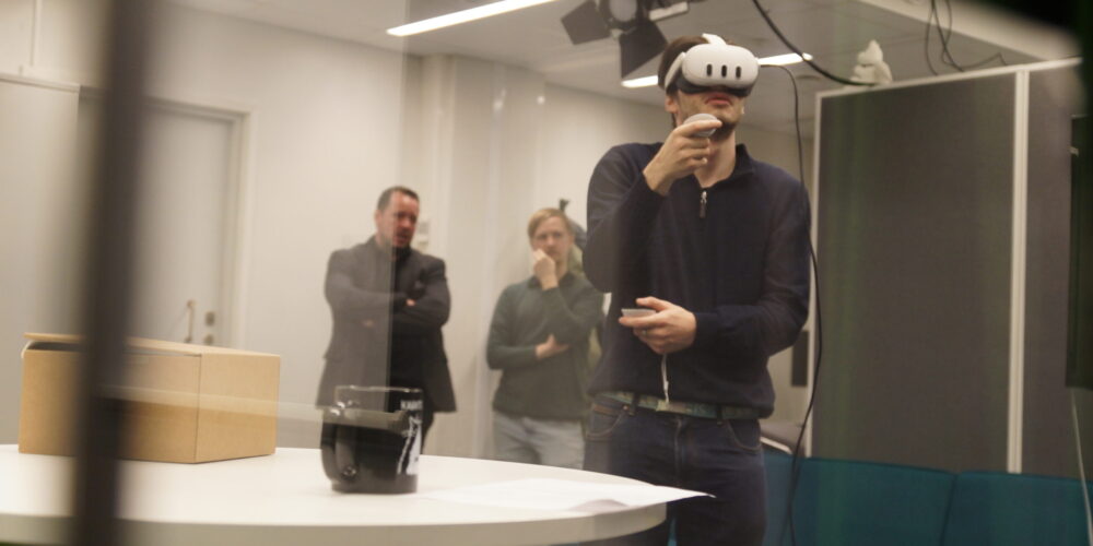 MR researchers testing a VR application